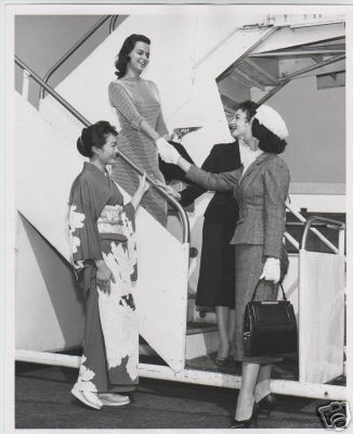 1957 Ladies on the boarding steps.